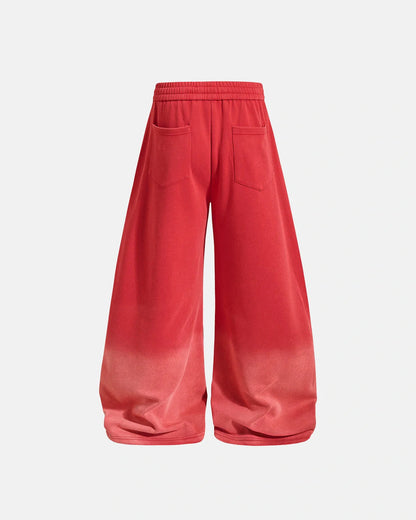 Full-length side profile of washed barrel-leg sweatpants on a model