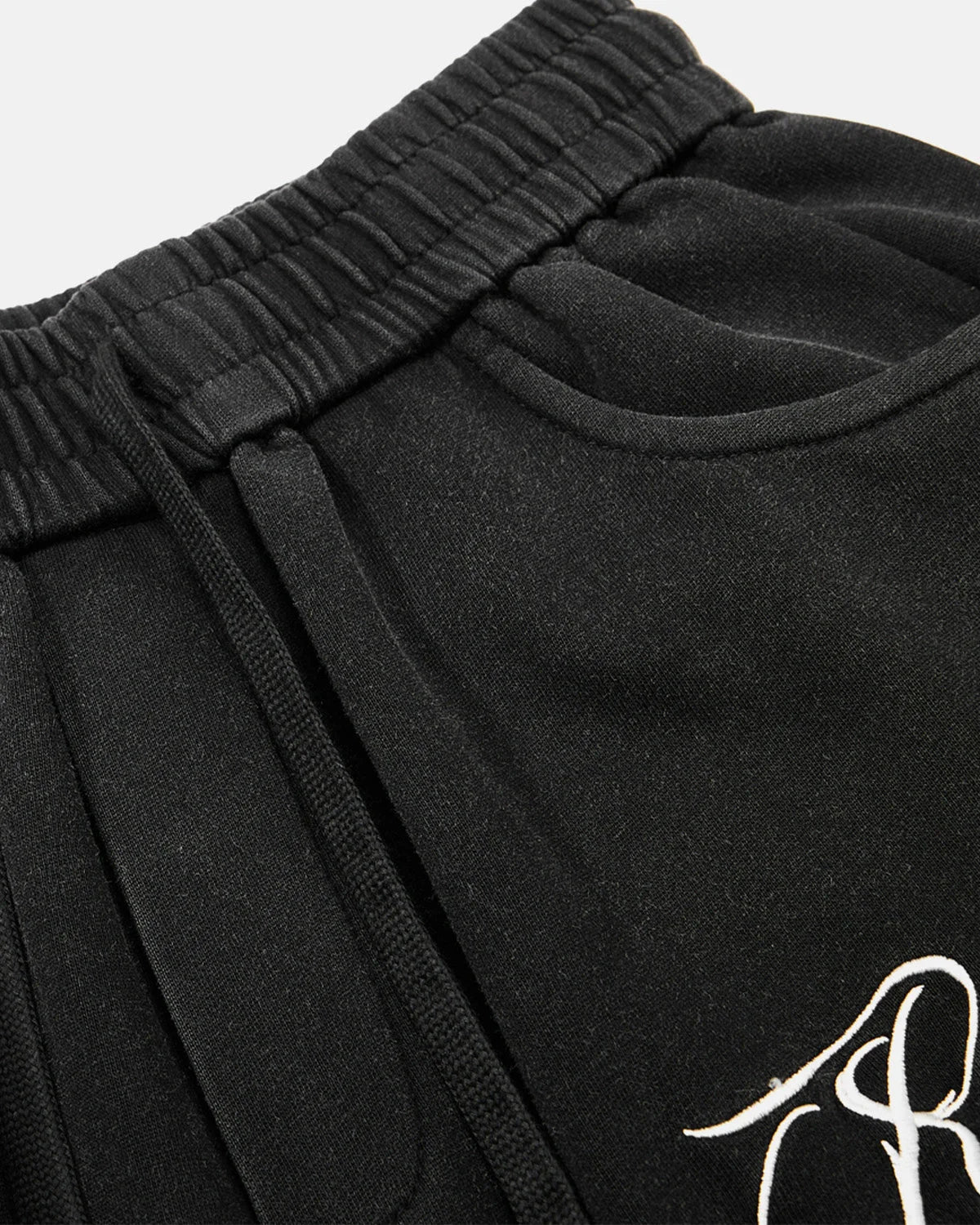 Close-up of cuff and fabric finish on gothic washed sweatpants
