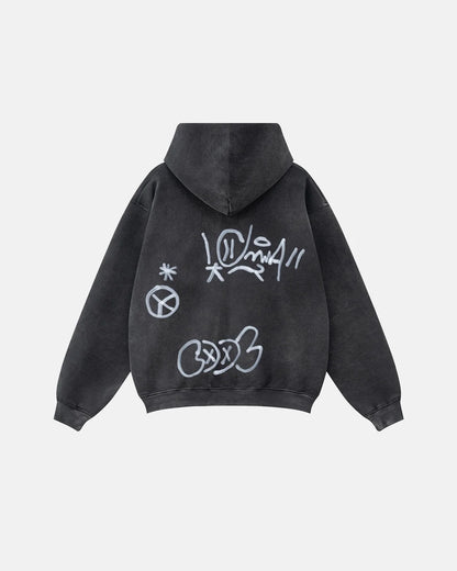 Hoodie front showing graphic graffiti design and drawstring hood