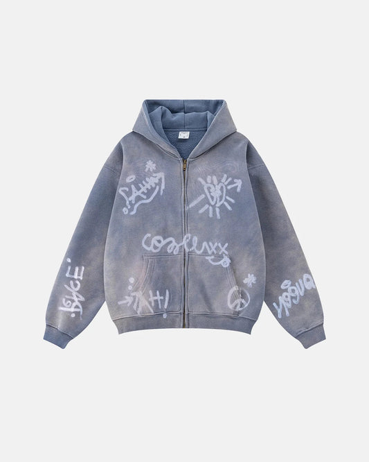 Washed graffiti zip-up hoodie shown from the front