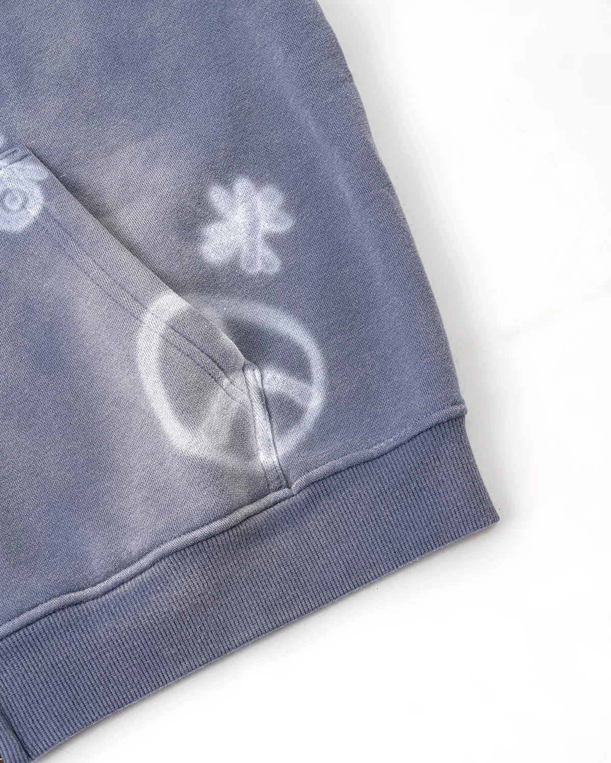 Detail of hoodie drawstrings and zip fastening