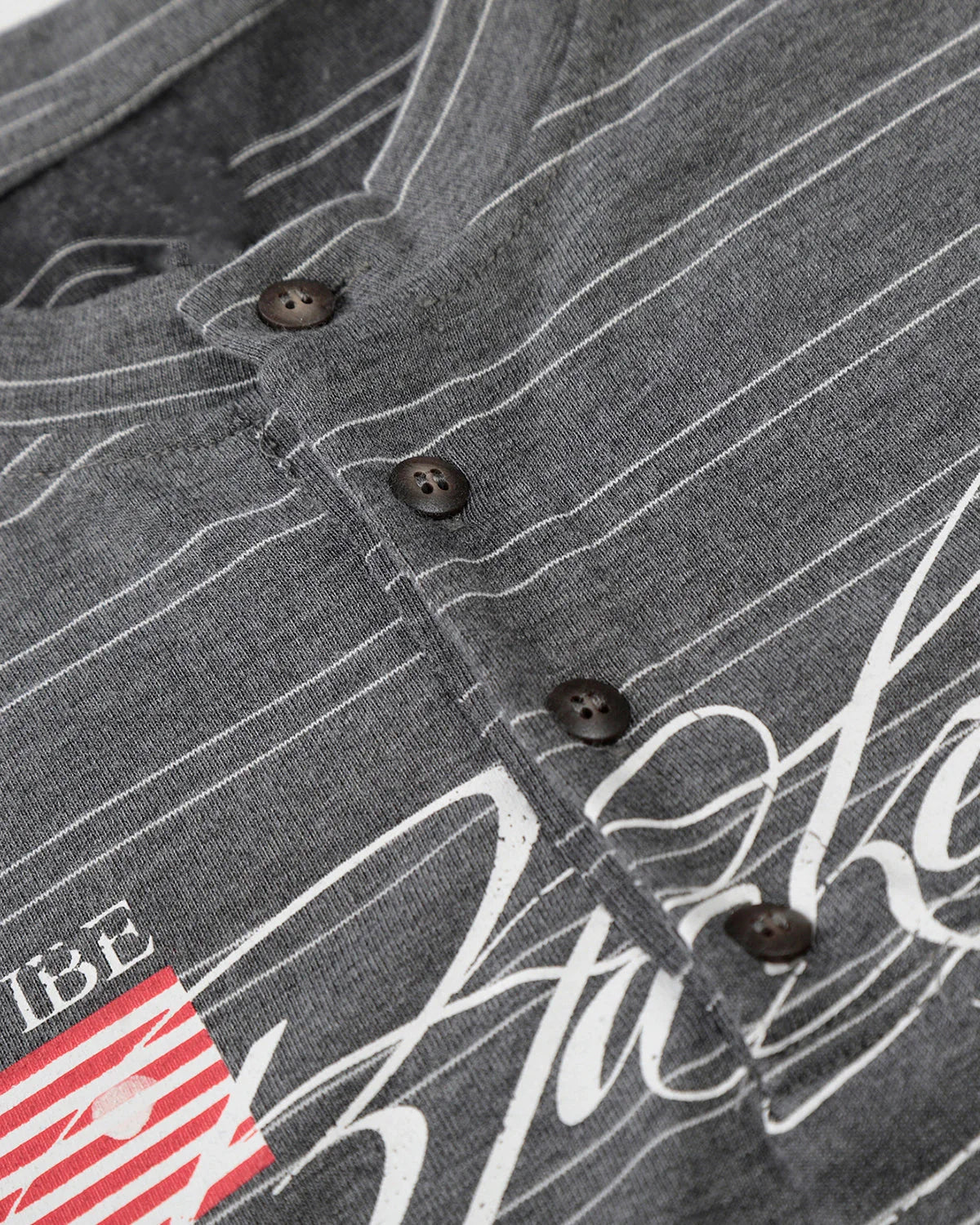Full product view of layered stripe Henley T-shirt for streetwear