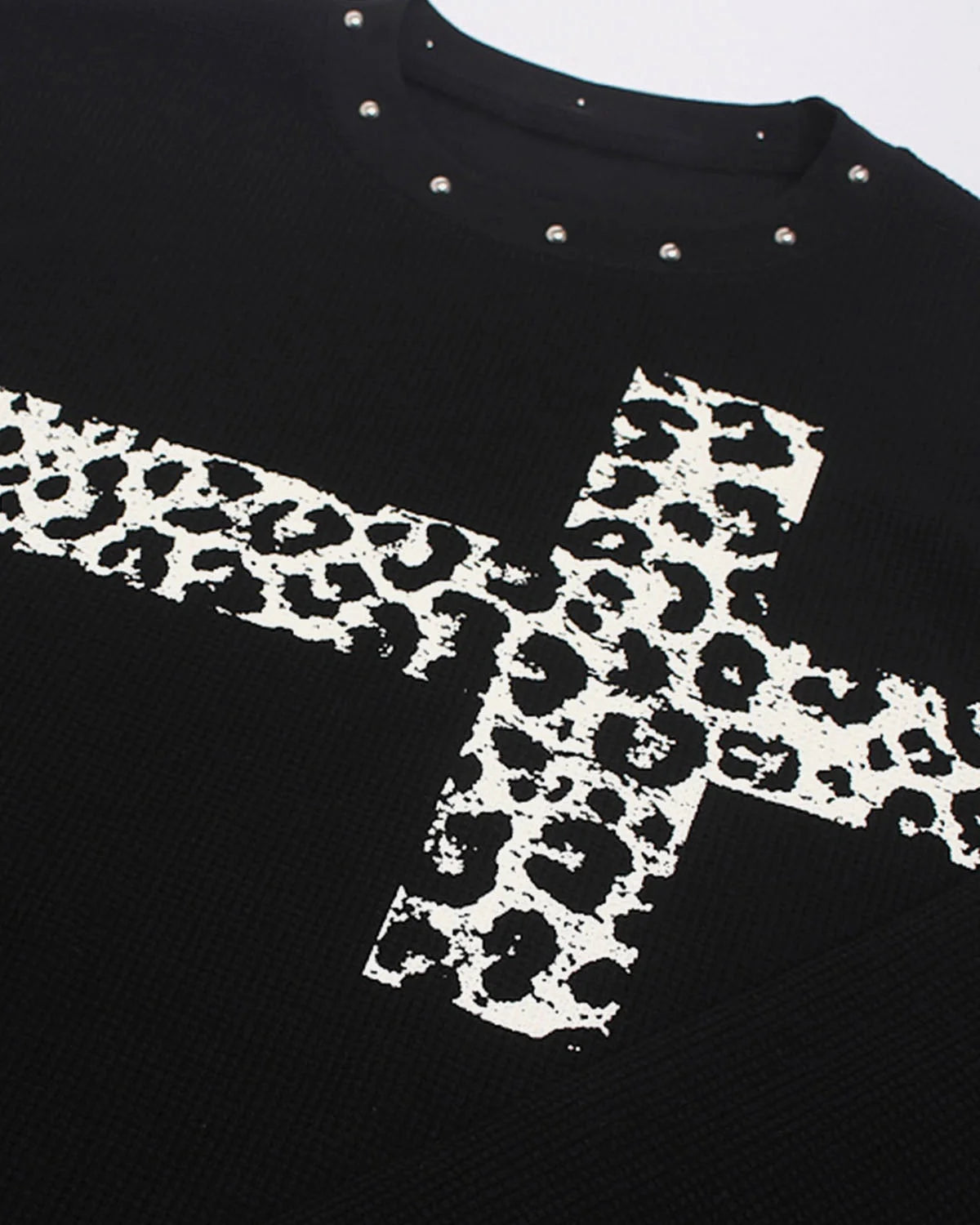 Casual leopard cross graphic T-shirt shown in a relaxed streetwear style