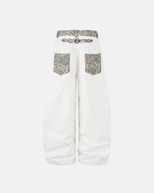 Side view of blue denim barrel jeans with relaxed fit