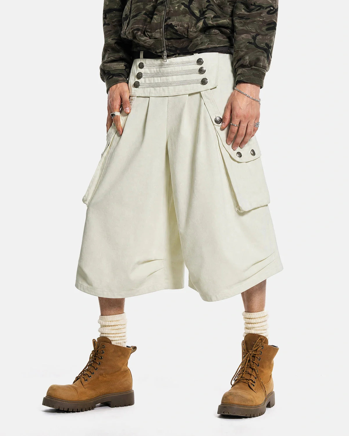 Men's longline cargo shorts shown from angled back view