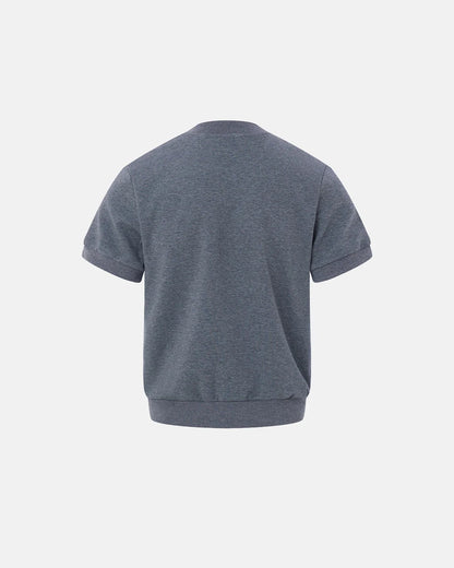 Close-up of the button placket on the short sleeve cardigan