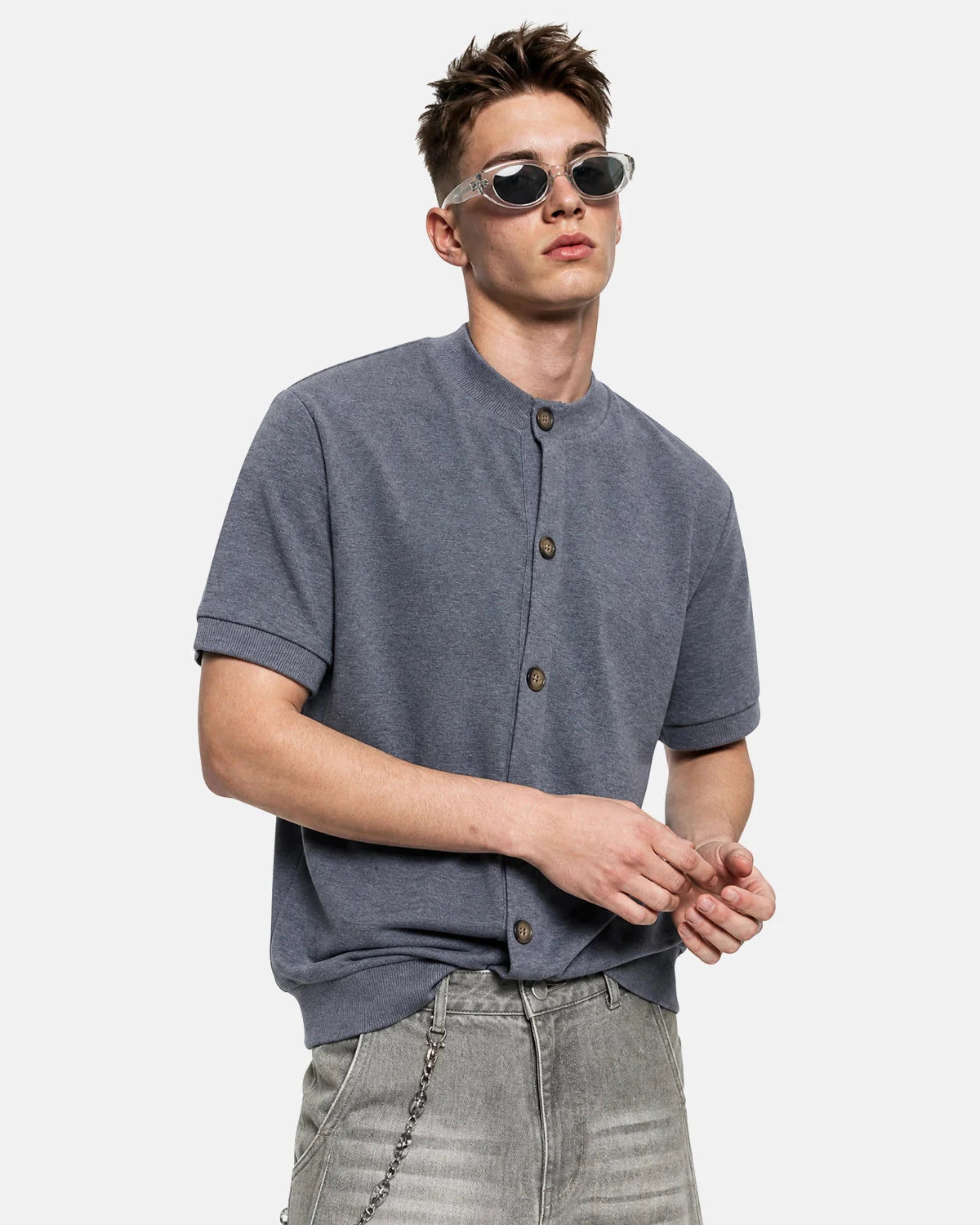 Short sleeve cardigan shown from the back with a clean, polished silhouette