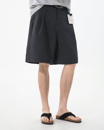 Men's tailored shorts displaying a classic pinstripe pattern