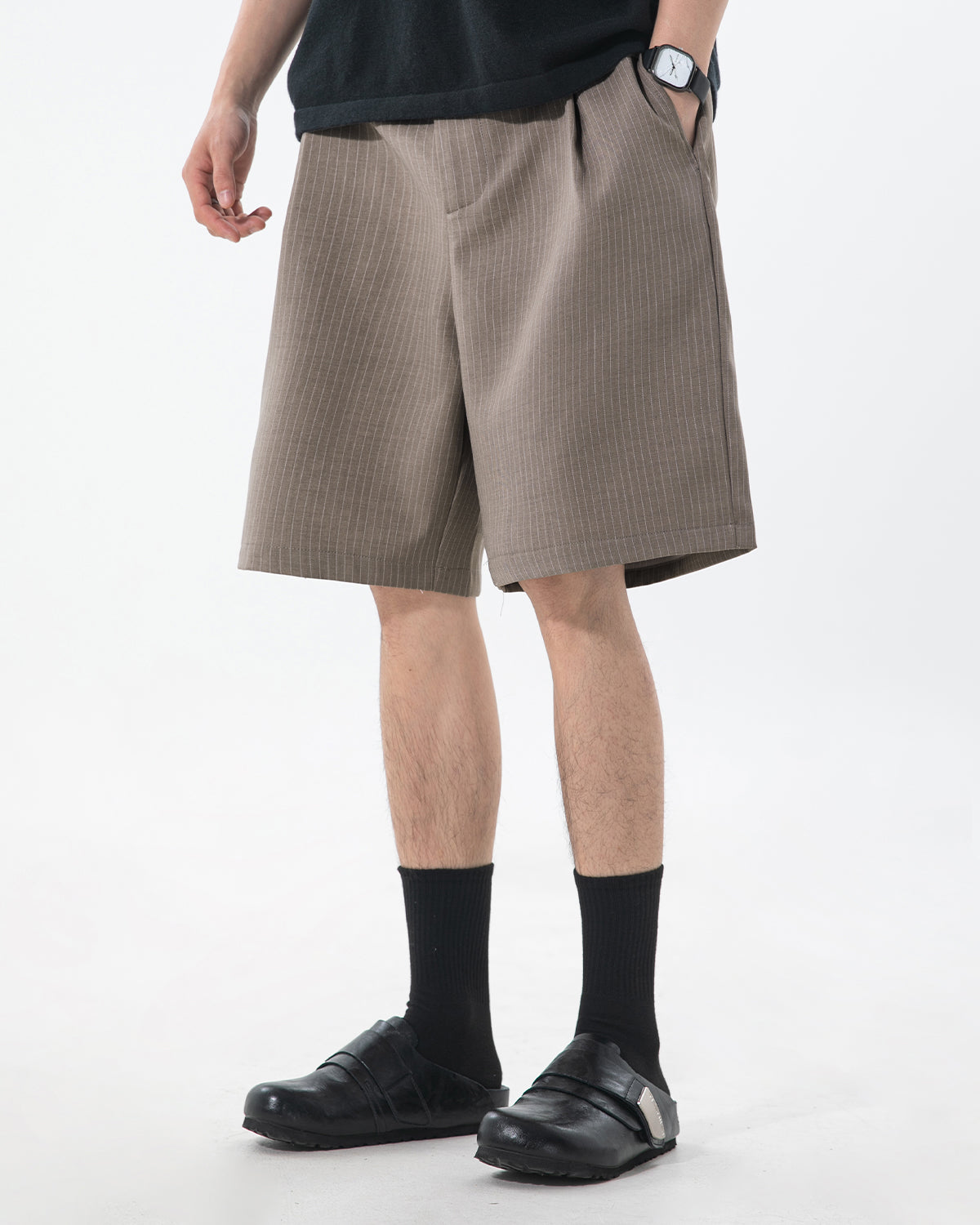 Waistband and tailored pleats on men's pinstripe shorts
