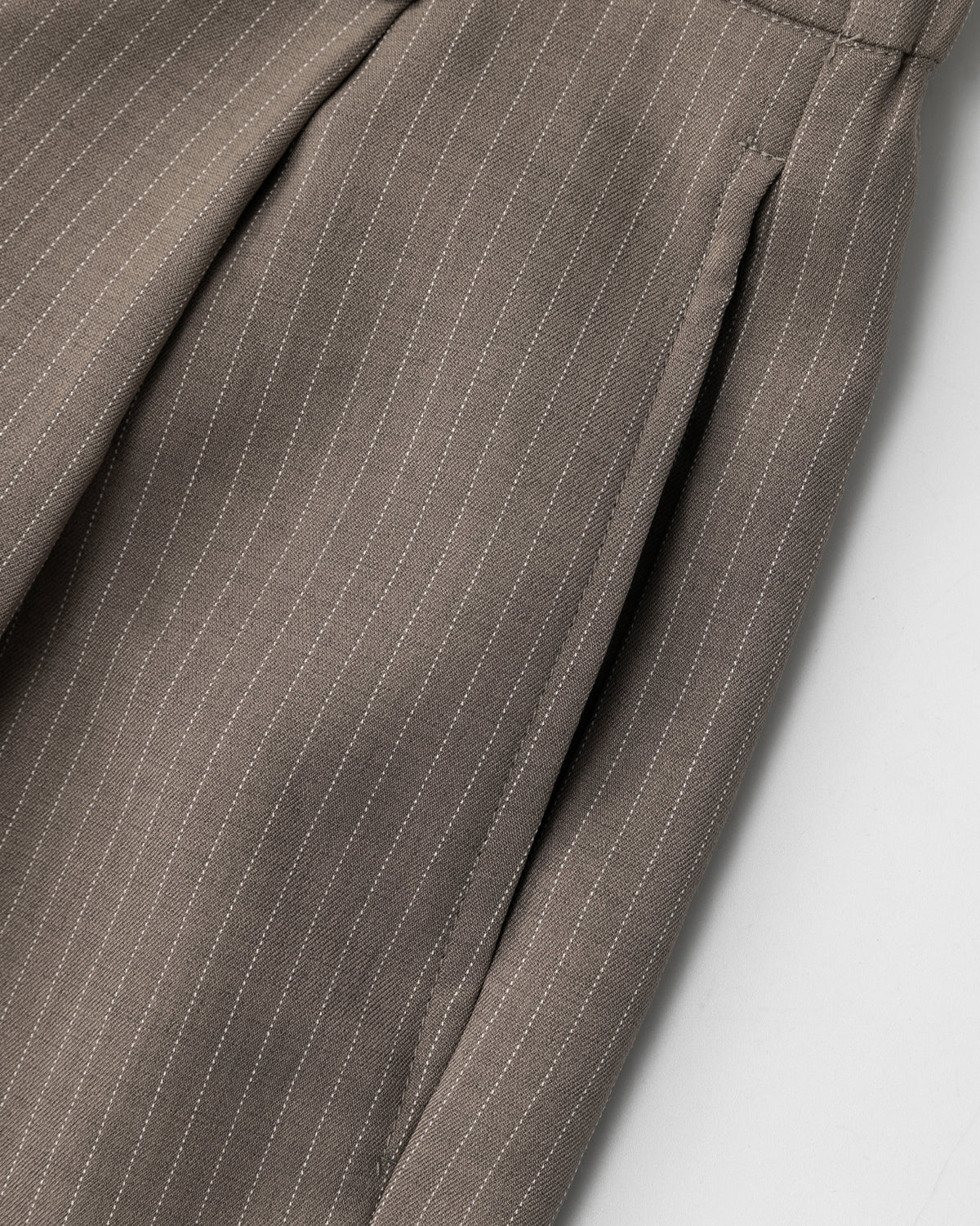Full view of men's pinstripe pleated tailored shorts