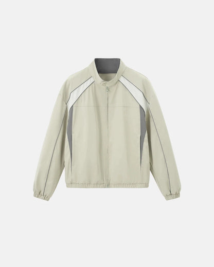 Reflective windbreaker jacket paired with casual everyday clothing