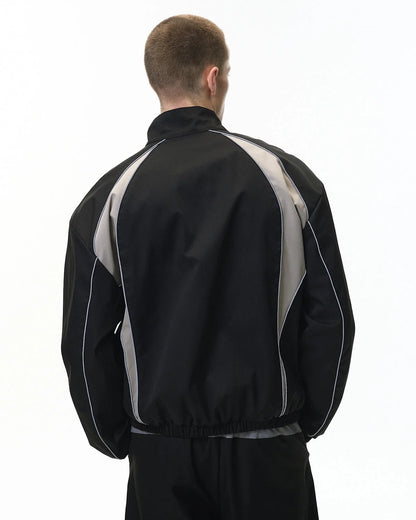 Windbreaker jacket showing its relaxed fit and full-length sleeves