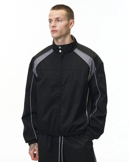 Reflective windbreaker jacket styled for a casual urban streetwear look