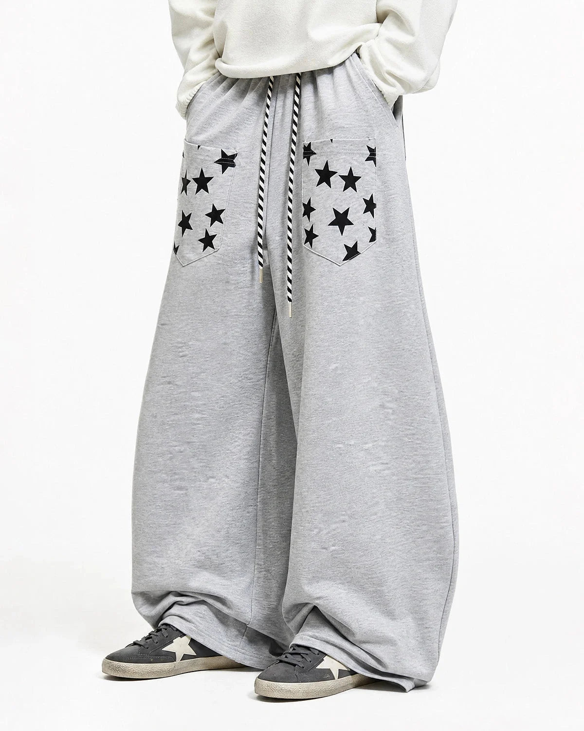 Full view of the star graphic barrel-leg joggers