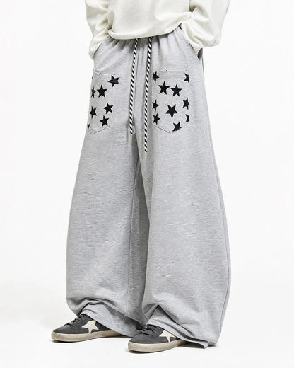 Full view of the star graphic barrel-leg joggers