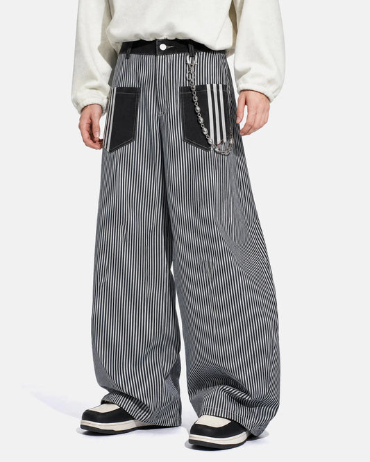 Front view of striped patch pocket baggy jeans in relaxed fit denim