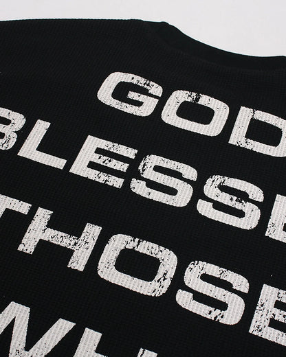 Graphic detail on a distressed waffle-knit long-sleeve T-shirt