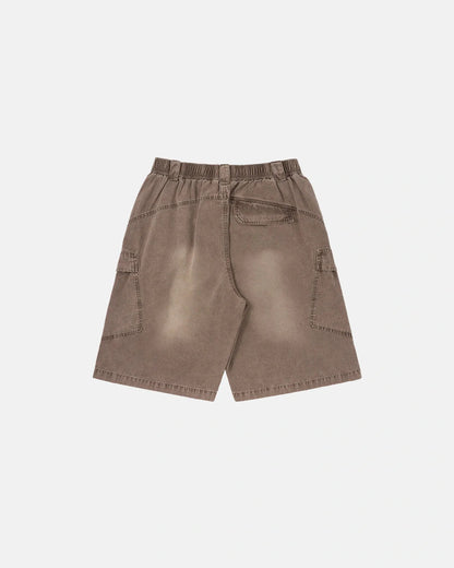 Side view of washed cargo shorts with flap utility pockets