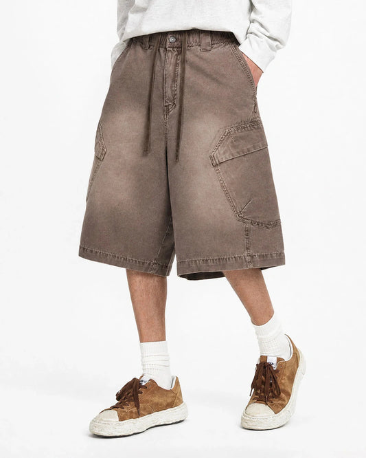 Washed cargo shorts with utility pockets shown from the front