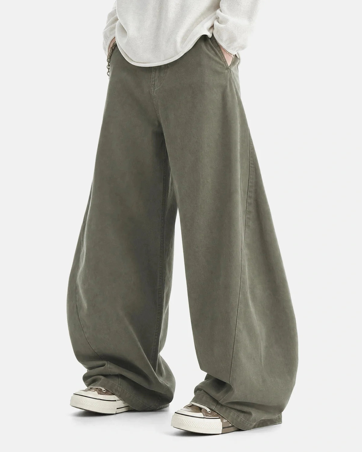 Waist and fastening detail on washed cotton cargo trousers