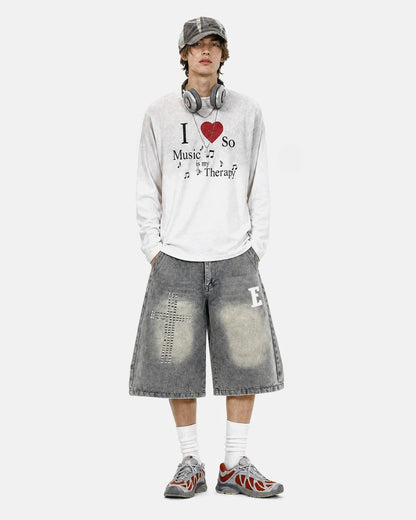 Casual washed cotton T-shirt with ribbed cuffs and music artwork