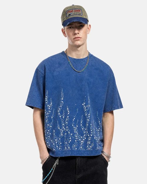 Washed boxy T-shirt with rhinestone flame graphic shown from the front
